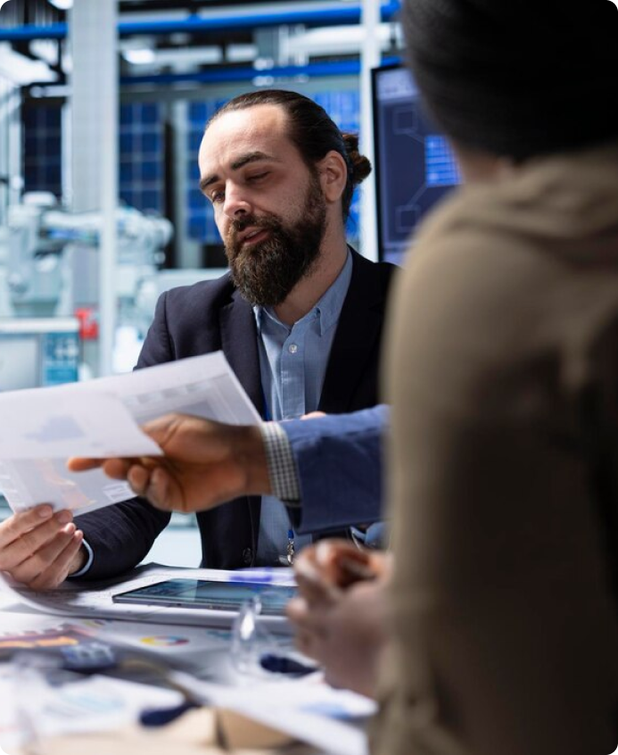 Consultant reviewing a document in an office setting